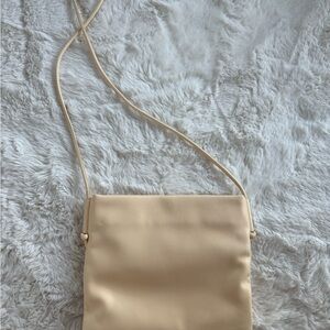 The Row Cream Crossbody Bag